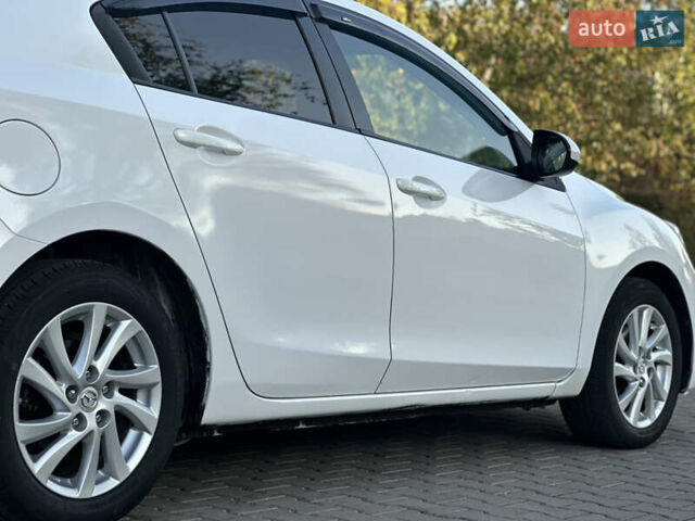 Белый Мазда 3, объемом двигателя 2 л и пробегом 165 тыс. км за 8000 $, фото 17 на Automoto.ua