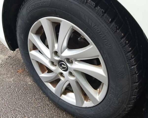 Белый Мазда 3, объемом двигателя 2 л и пробегом 252 тыс. км за 8300 $, фото 18 на Automoto.ua