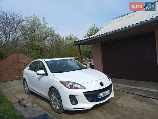 Белый Мазда 3, объемом двигателя 2 л и пробегом 252 тыс. км за 8300 $, фото 2 на Automoto.ua