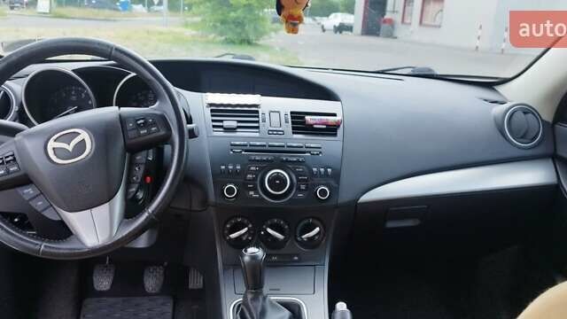 Белый Мазда 3, объемом двигателя 2 л и пробегом 200 тыс. км за 7500 $, фото 12 на Automoto.ua