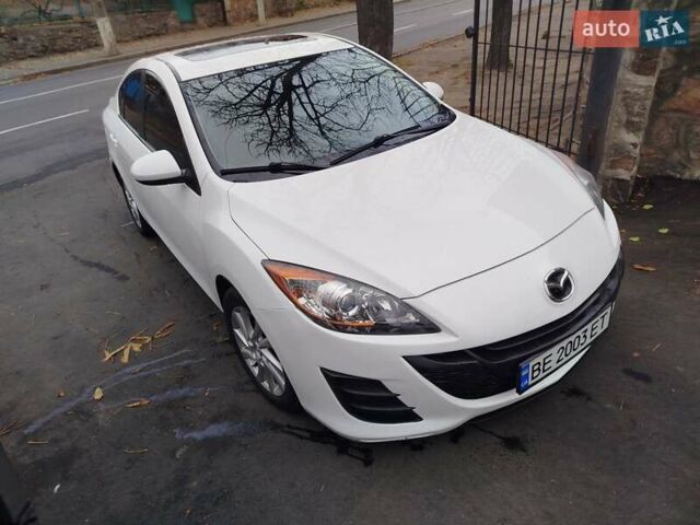 Белый Мазда 3, объемом двигателя 2 л и пробегом 220 тыс. км за 6600 $, фото 1 на Automoto.ua