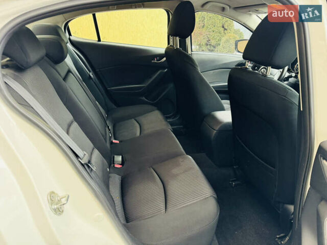 Белый Мазда 3, объемом двигателя 2 л и пробегом 157 тыс. км за 7950 $, фото 15 на Automoto.ua