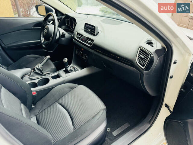 Белый Мазда 3, объемом двигателя 2 л и пробегом 157 тыс. км за 7950 $, фото 18 на Automoto.ua