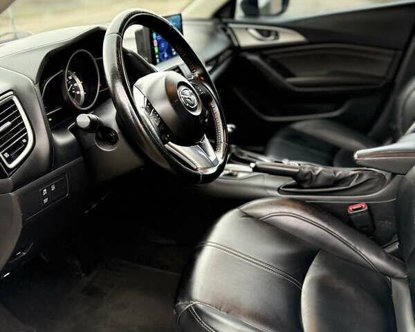 Белый Мазда 3, объемом двигателя 2 л и пробегом 183 тыс. км за 9500 $, фото 21 на Automoto.ua