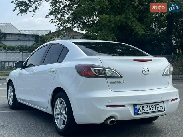 Белый Мазда 3, объемом двигателя 2 л и пробегом 170 тыс. км за 8400 $, фото 12 на Automoto.ua