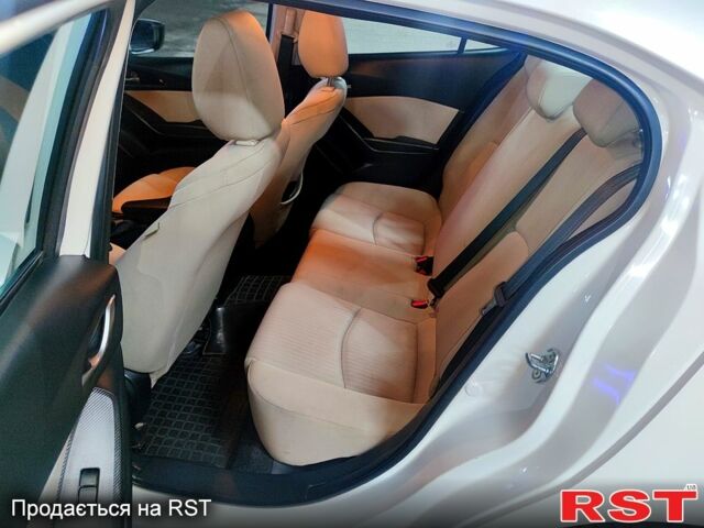 Белый Мазда 3, объемом двигателя 2 л и пробегом 193 тыс. км за 9900 $, фото 6 на Automoto.ua