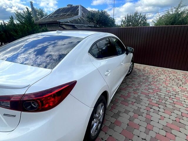 Белый Мазда 3, объемом двигателя 2 л и пробегом 140 тыс. км за 10100 $, фото 4 на Automoto.ua