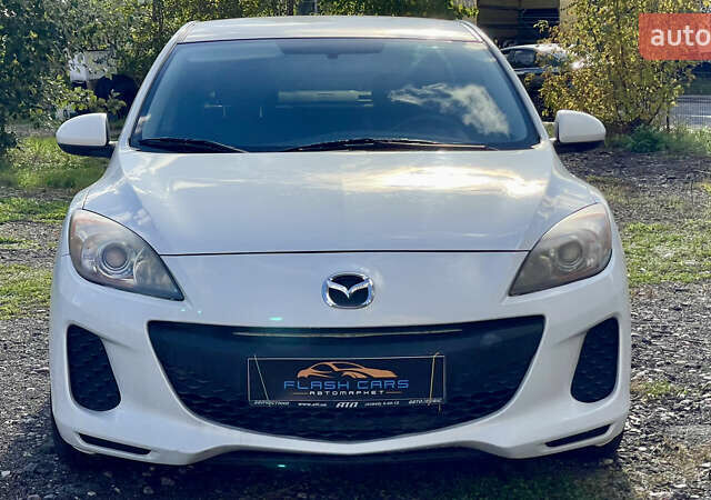 Білий Мазда 3, об'ємом двигуна 2 л та пробігом 170 тис. км за 8199 $, фото 1 на Automoto.ua