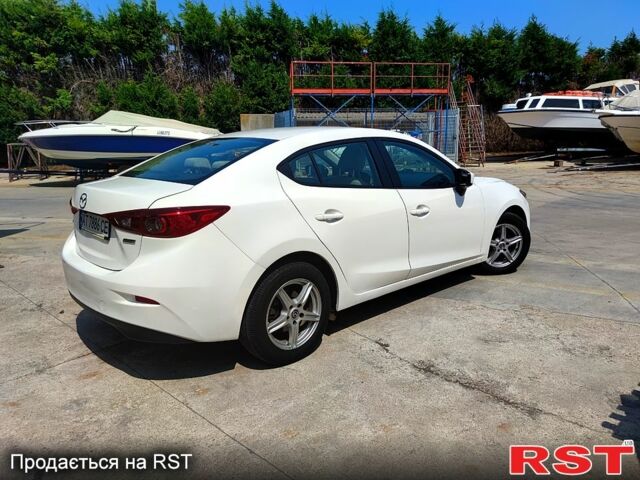 Белый Мазда 3, объемом двигателя 2 л и пробегом 193 тыс. км за 9900 $, фото 3 на Automoto.ua