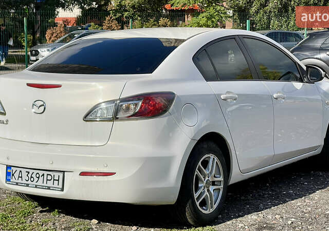 Білий Мазда 3, об'ємом двигуна 2 л та пробігом 170 тис. км за 8199 $, фото 5 на Automoto.ua