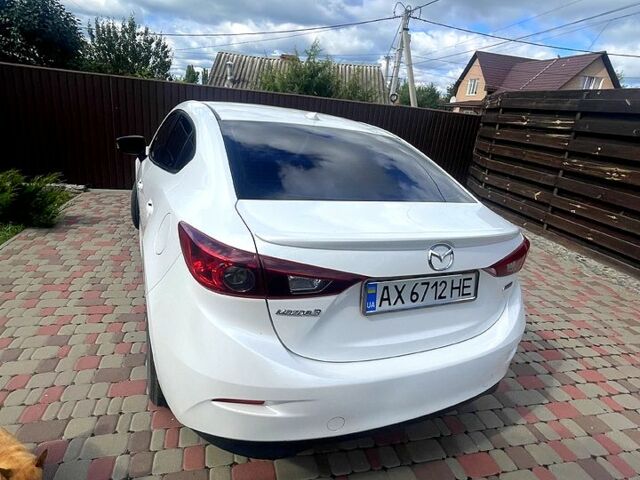 Белый Мазда 3, объемом двигателя 2 л и пробегом 140 тыс. км за 10100 $, фото 5 на Automoto.ua