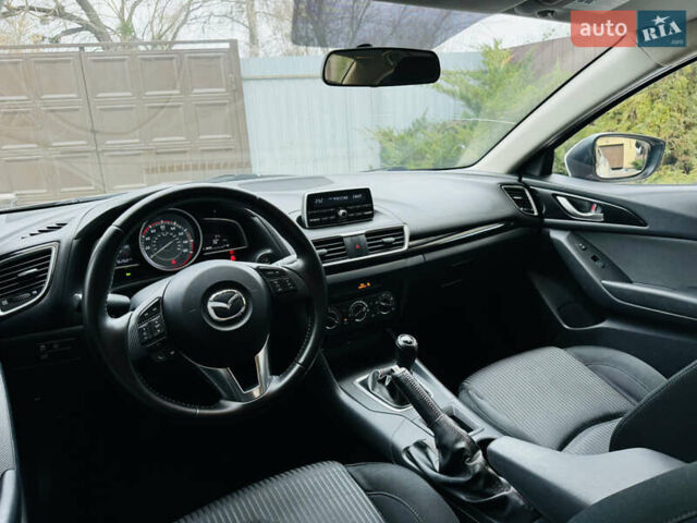 Белый Мазда 3, объемом двигателя 2 л и пробегом 157 тыс. км за 7950 $, фото 14 на Automoto.ua