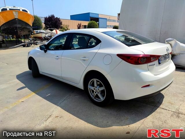 Белый Мазда 3, объемом двигателя 2 л и пробегом 193 тыс. км за 9900 $, фото 2 на Automoto.ua