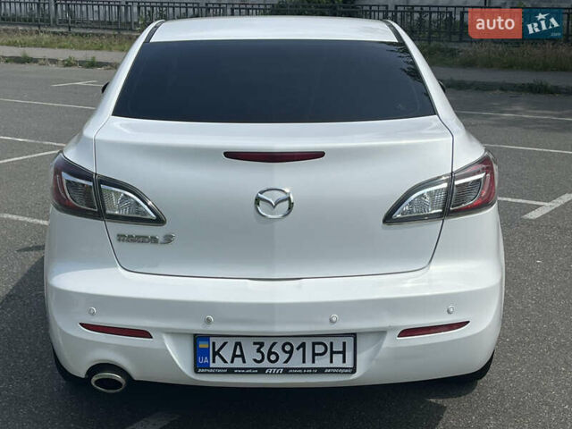 Белый Мазда 3, объемом двигателя 2 л и пробегом 170 тыс. км за 8400 $, фото 19 на Automoto.ua