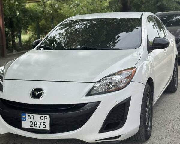 Білий Мазда 3, об'ємом двигуна 2 л та пробігом 234 тис. км за 7000 $, фото 1 на Automoto.ua