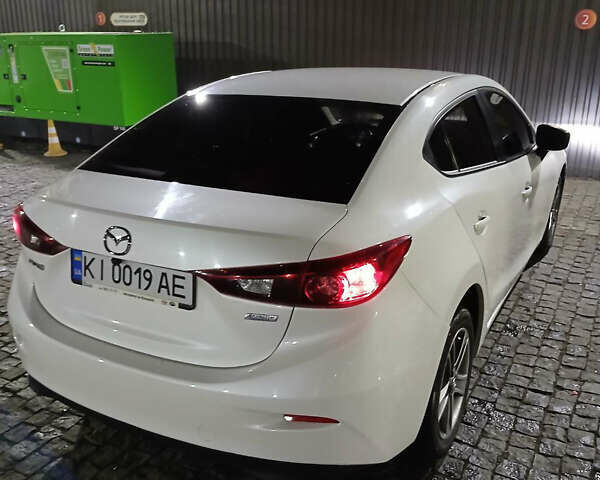 Белый Мазда 3, объемом двигателя 2 л и пробегом 123 тыс. км за 8900 $, фото 25 на Automoto.ua