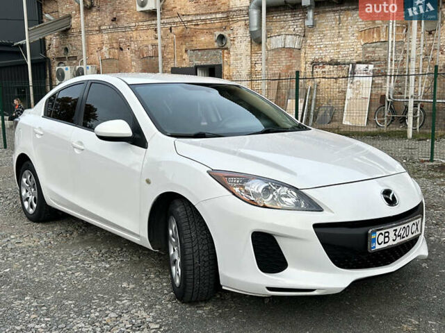 Мазда 3 2013 у Прилуках на Automoto.ua Білий Мазда 3, об'ємом двигуна 2 л та пробігом 215 тис. км за 7650 $, фото 7 на Automoto.ua