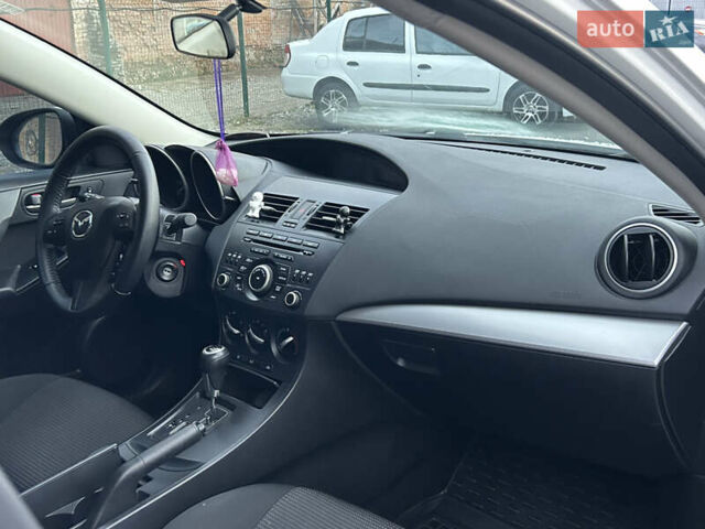 Мазда 3 2013 у Прилуках на Automoto.ua Білий Мазда 3, об'ємом двигуна 2 л та пробігом 215 тис. км за 7650 $, фото 14 на Automoto.ua