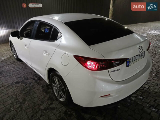 Белый Мазда 3, объемом двигателя 2 л и пробегом 123 тыс. км за 8900 $, фото 20 на Automoto.ua