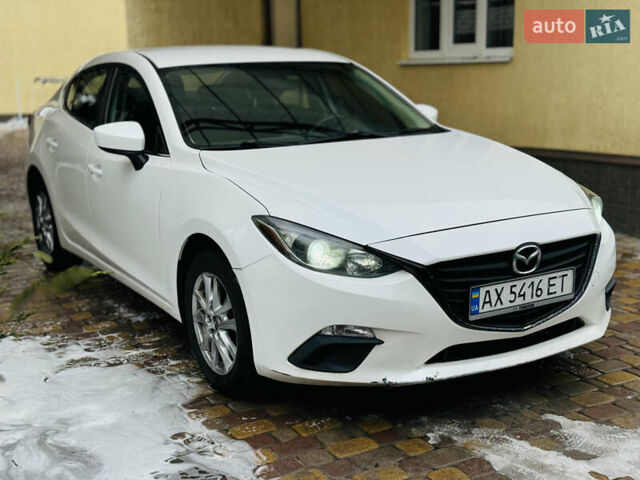 Белый Мазда 3, объемом двигателя 2 л и пробегом 157 тыс. км за 7950 $, фото 1 на Automoto.ua