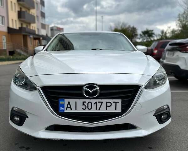 Белый Мазда 3, объемом двигателя 2 л и пробегом 136 тыс. км за 9600 $, фото 1 на Automoto.ua