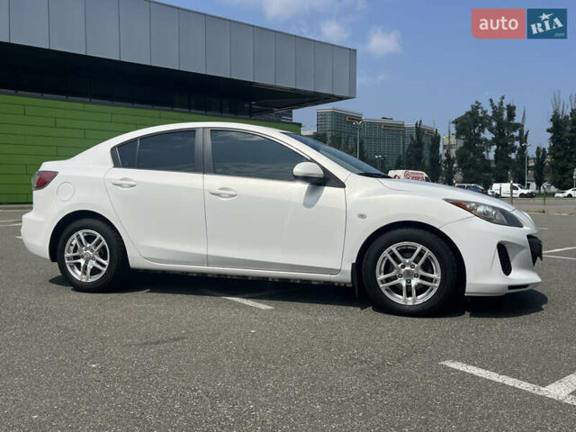 Белый Мазда 3, объемом двигателя 2 л и пробегом 170 тыс. км за 8400 $, фото 22 на Automoto.ua