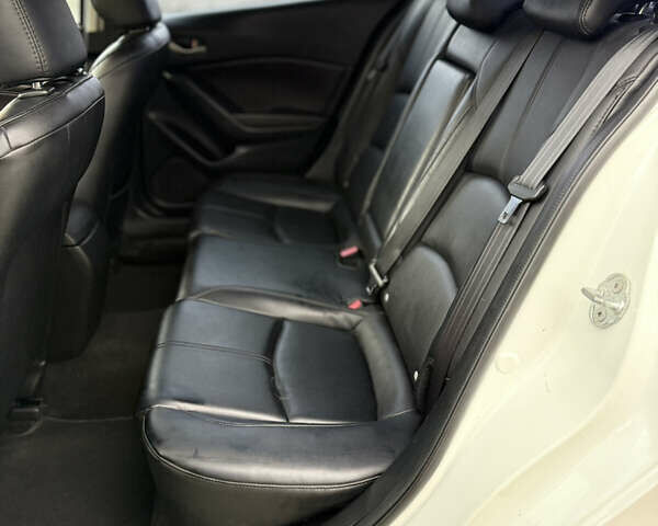 Белый Мазда 3, объемом двигателя 2 л и пробегом 183 тыс. км за 9500 $, фото 22 на Automoto.ua