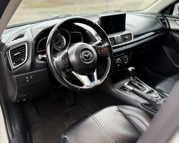 Белый Мазда 3, объемом двигателя 2 л и пробегом 183 тыс. км за 9500 $, фото 20 на Automoto.ua