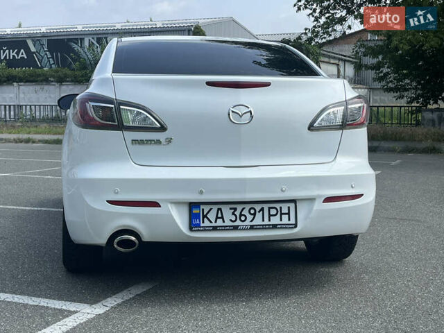 Белый Мазда 3, объемом двигателя 2 л и пробегом 170 тыс. км за 8400 $, фото 17 на Automoto.ua