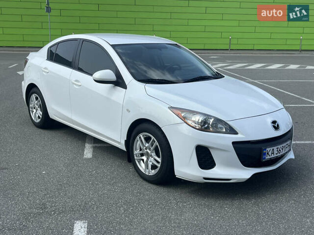 Белый Мазда 3, объемом двигателя 2 л и пробегом 170 тыс. км за 8400 $, фото 29 на Automoto.ua