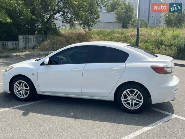 Белый Мазда 3, объемом двигателя 2 л и пробегом 170 тыс. км за 8400 $, фото 9 на Automoto.ua