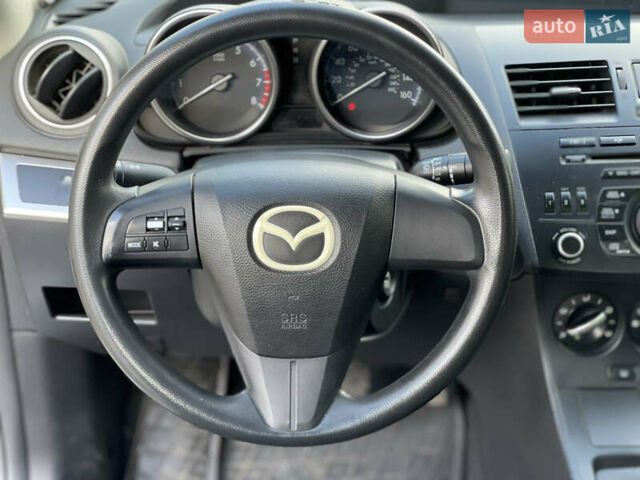 Білий Мазда 3, об'ємом двигуна 2 л та пробігом 170 тис. км за 8199 $, фото 9 на Automoto.ua