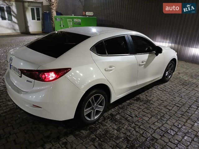 Белый Мазда 3, объемом двигателя 2 л и пробегом 123 тыс. км за 8900 $, фото 4 на Automoto.ua