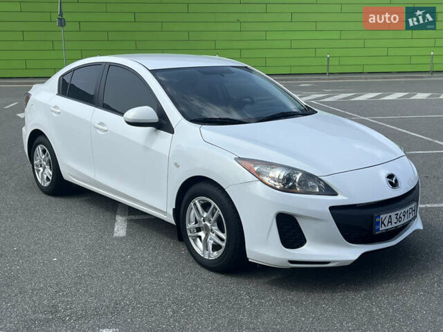 Белый Мазда 3, объемом двигателя 2 л и пробегом 170 тыс. км за 8400 $, фото 30 на Automoto.ua