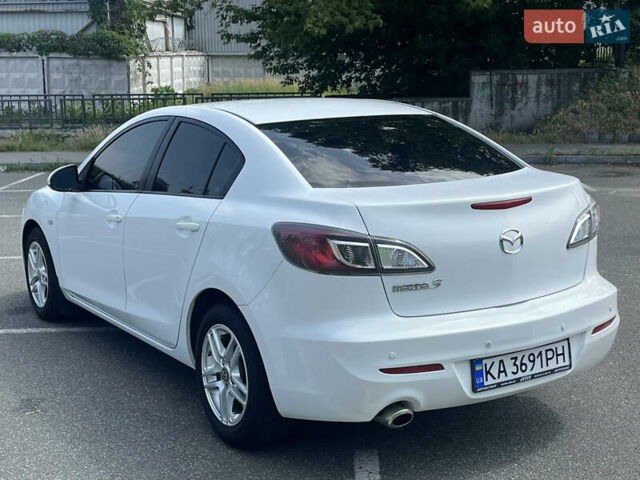 Белый Мазда 3, объемом двигателя 2 л и пробегом 170 тыс. км за 8400 $, фото 13 на Automoto.ua