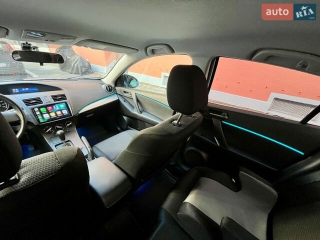 Білий Мазда 3, об'ємом двигуна 2 л та пробігом 130 тис. км за 7482 $, фото 5 на Automoto.ua
