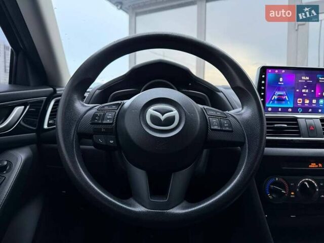 Білий Мазда 3, об'ємом двигуна 2 л та пробігом 195 тис. км за 10490 $, фото 14 на Automoto.ua
