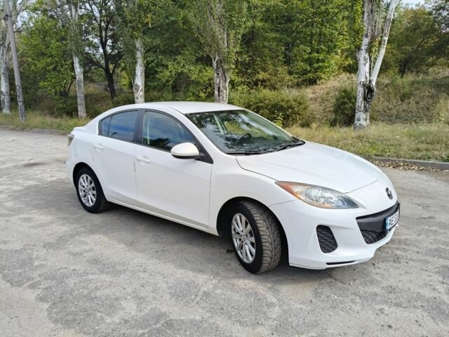 Белый Мазда 3, объемом двигателя 2 л и пробегом 220 тыс. км за 6032 $, фото 1 на Automoto.ua