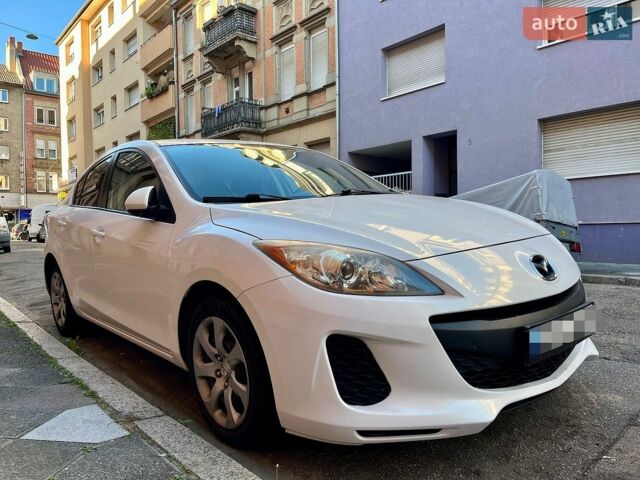 Білий Мазда 3, об'ємом двигуна 2 л та пробігом 130 тис. км за 7482 $, фото 2 на Automoto.ua