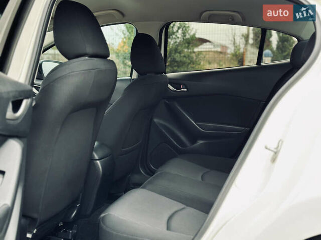 Белый Мазда 3, объемом двигателя 2 л и пробегом 208 тыс. км за 8899 $, фото 17 на Automoto.ua
