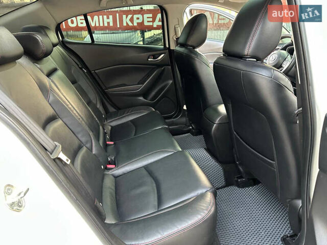 Білий Мазда 3, об'ємом двигуна 2 л та пробігом 276 тис. км за 7999 $, фото 32 на Automoto.ua