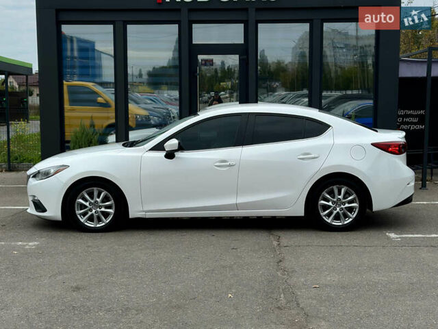 Белый Мазда 3, объемом двигателя 2 л и пробегом 208 тыс. км за 8899 $, фото 2 на Automoto.ua