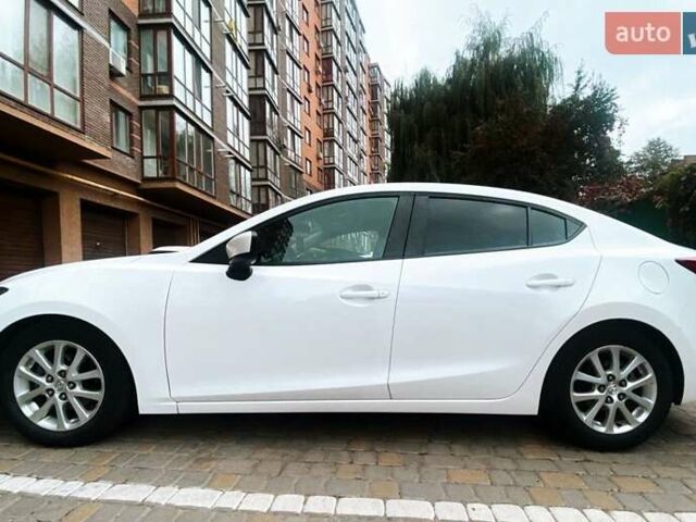 Белый Мазда 3, объемом двигателя 2 л и пробегом 148 тыс. км за 10300 $, фото 1 на Automoto.ua