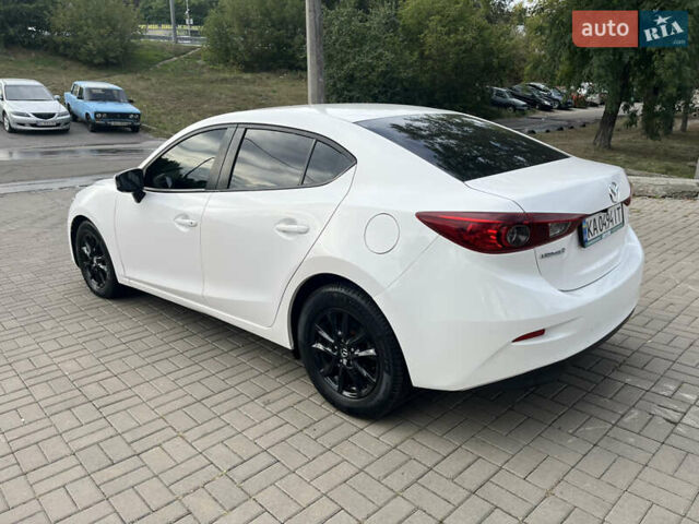 Білий Мазда 3, об'ємом двигуна 2 л та пробігом 175 тис. км за 10700 $, фото 11 на Automoto.ua