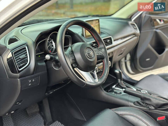 Білий Мазда 3, об'ємом двигуна 2 л та пробігом 276 тис. км за 7999 $, фото 6 на Automoto.ua