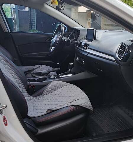 Білий Мазда 3, об'ємом двигуна 2 л та пробігом 157 тис. км за 10200 $, фото 20 на Automoto.ua