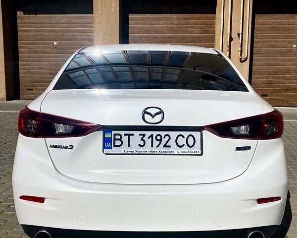 Белый Мазда 3, объемом двигателя 2 л и пробегом 148 тыс. км за 10300 $, фото 5 на Automoto.ua
