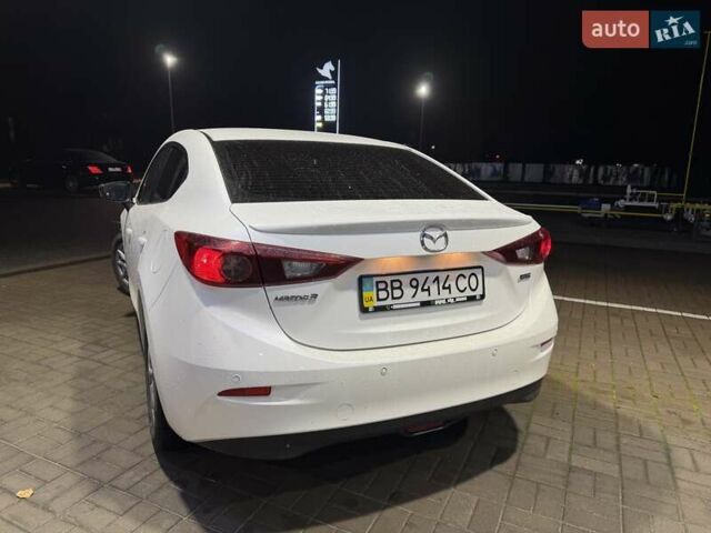 Белый Мазда 3, объемом двигателя 1.5 л и пробегом 56 тыс. км за 14000 $, фото 9 на Automoto.ua