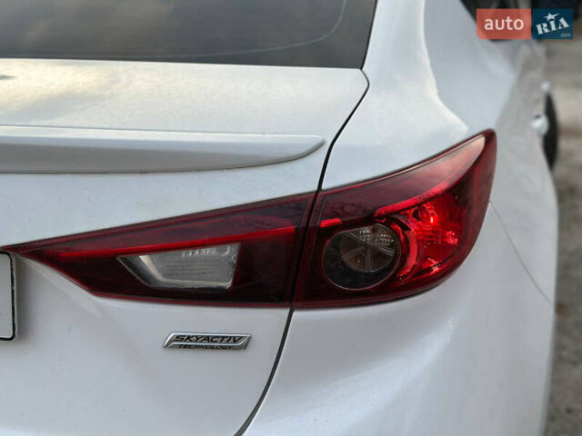 Білий Мазда 3, об'ємом двигуна 2 л та пробігом 276 тис. км за 7999 $, фото 36 на Automoto.ua