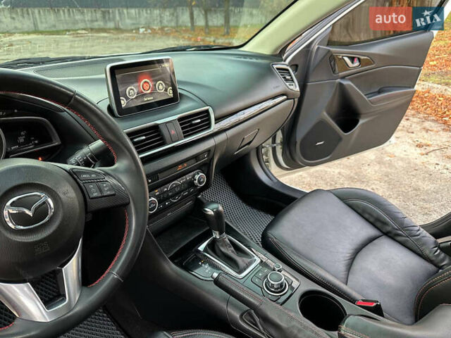 Білий Мазда 3, об'ємом двигуна 2 л та пробігом 276 тис. км за 7999 $, фото 8 на Automoto.ua